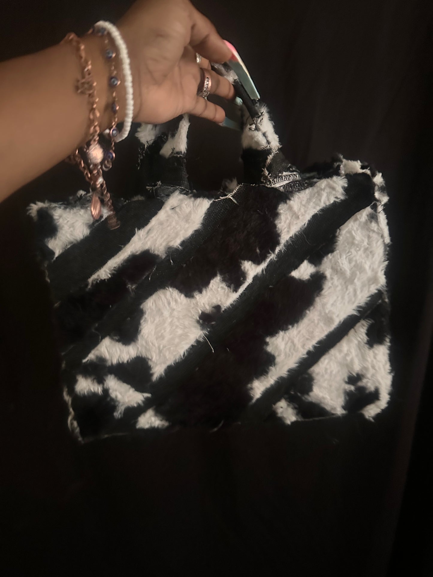 Cow print faux fur tote