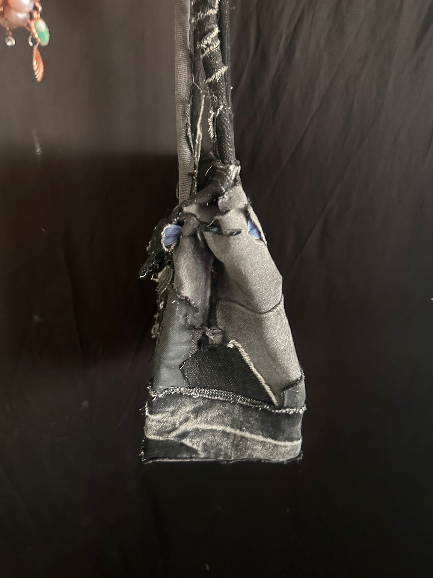 Distressed black denim bag