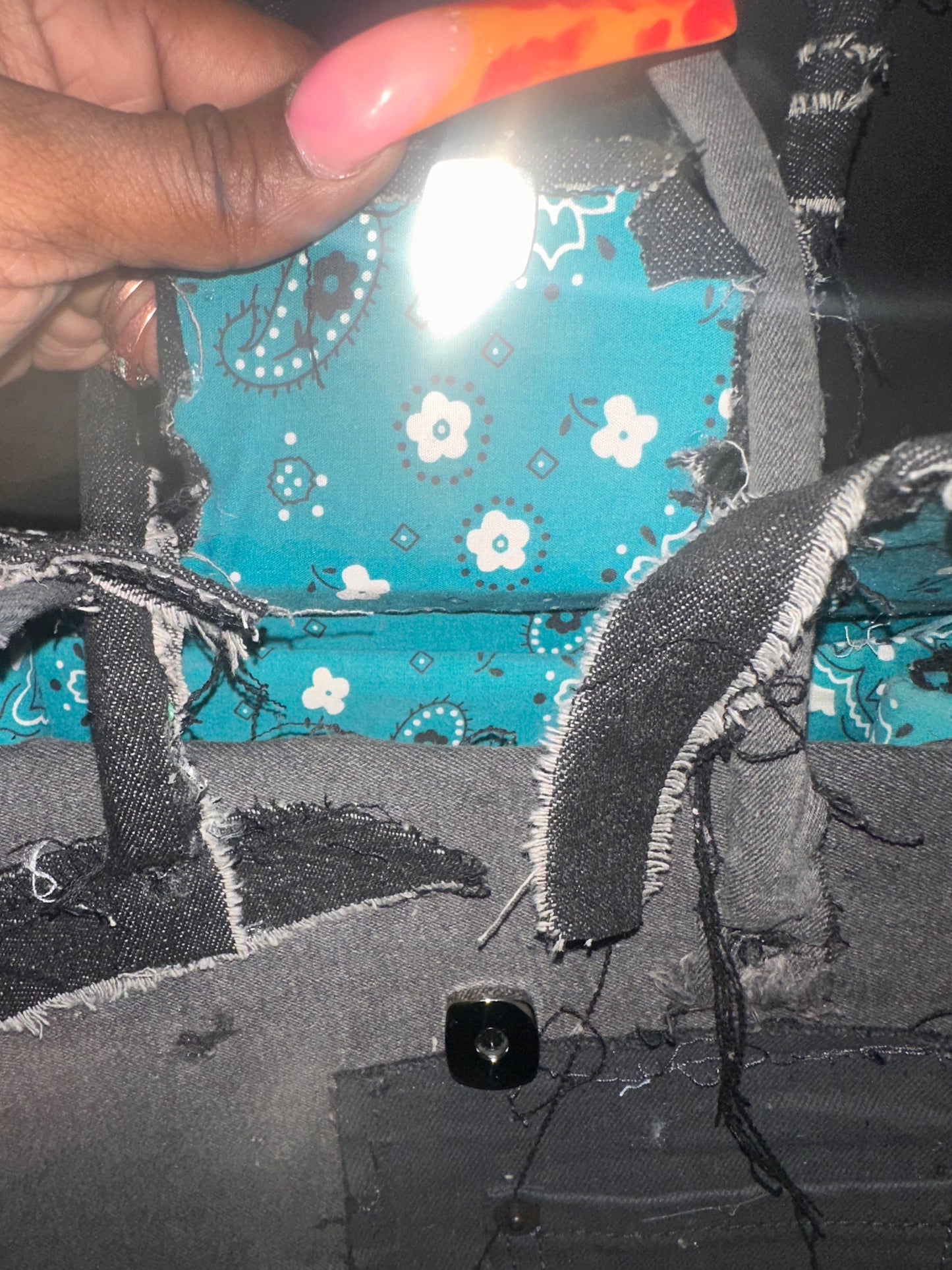 Distressed black denim bag