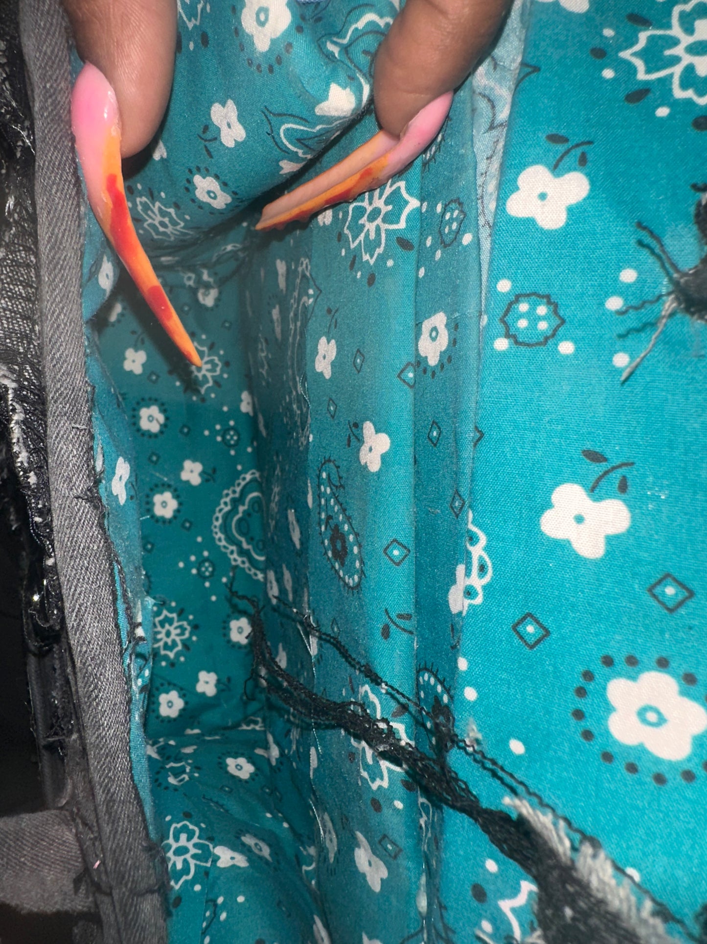 Distressed black denim bag